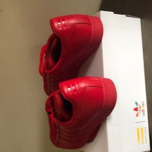 Men Size 12 Pharrell Williams Converse Sneakers.